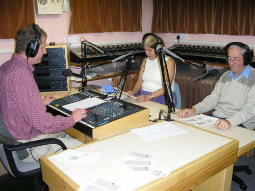 Studio photo of the Presenter and two of our readers